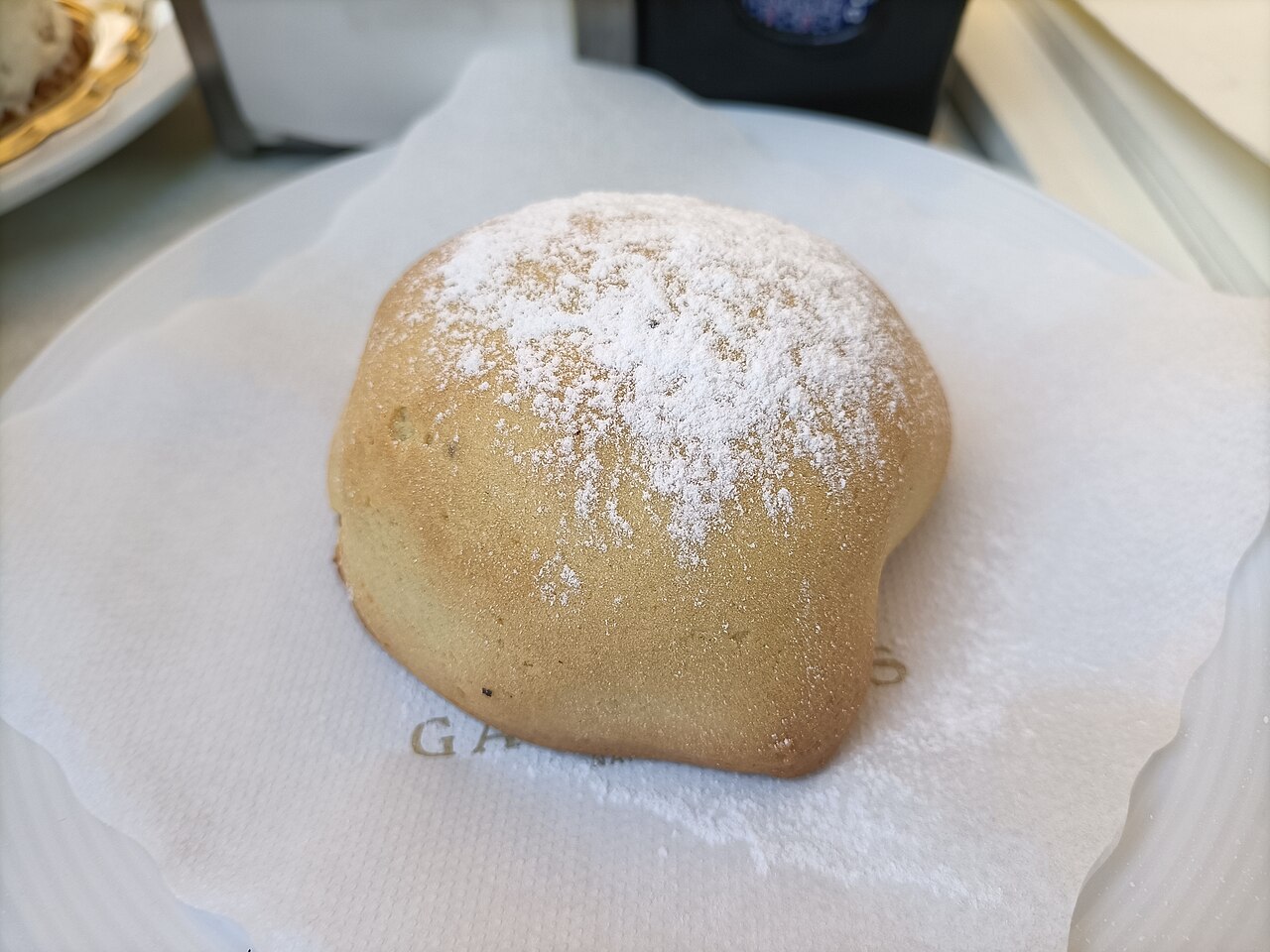 Real round sfogliatella frolla pastry in Naples
