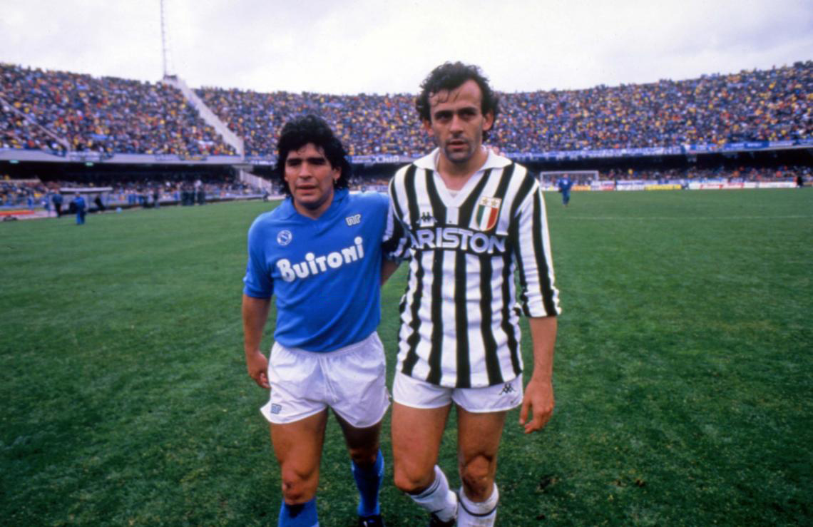 Diego Maradona in Napoli blue beside Michel Platini before Napoli versus Juventus in 1987