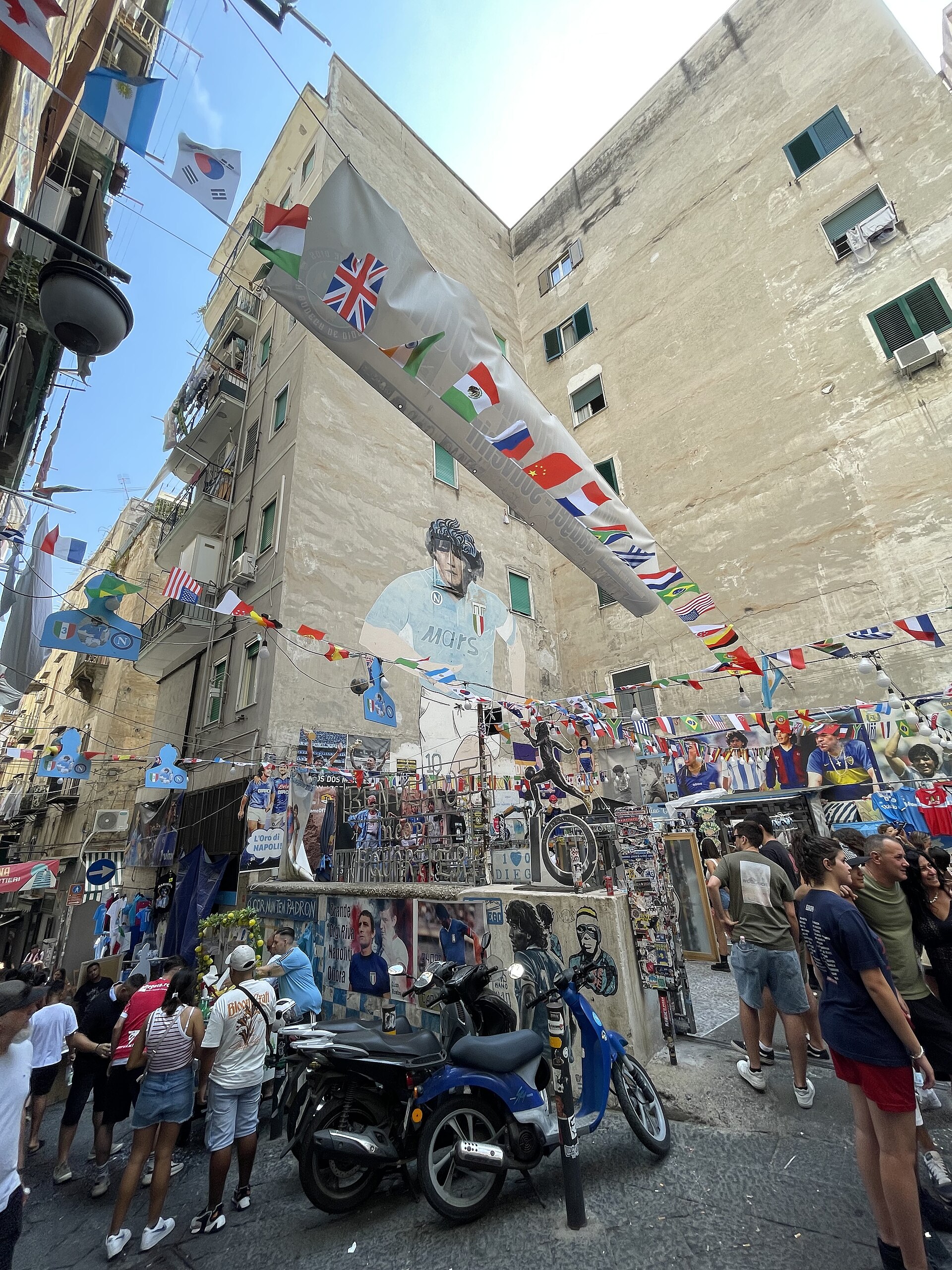 Real street-level view of the Diego Maradona mural and tributes in Quartieri Spagnoli
